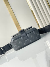 GETAWAY MESSENGER 18 IN GUN METAL MONOGRAM ECLIPSE CANVAS