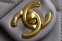 CHANEL 25S FLAP BAG 21 CM IN LIGHT PURPLE LAMBSKIN WITH GOLD HARDWARE