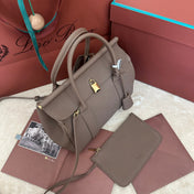 LOOM BAG 25 IN CEDAR BROWN CALFSKIN WITH GOLD HARDWARE