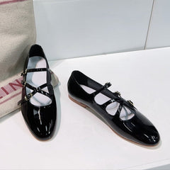 LES BALLERINES CELINE BABIES IN BLACK PATENT CALFSKIN