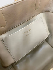 MEDIUM TOUJOURS BUCKET BAG 22 IN BEIGE CANNAGE CALFSKIN