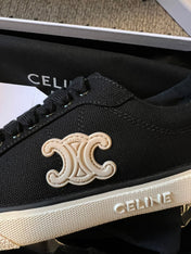 TRAINER LOW LACE-UP SNEAKER IN BLACK CANVAS