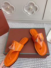 FLIP FLOPS IN ORANGE LAMBSKIN SNAKE EMBOSSING