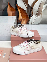 WASHED-DENIM SNEAKERS IN OFF WHITE CANVAS WITH BROWN AND STRIPED LACES