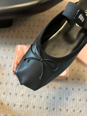 MIUMIU 26S BALLET MULES IN BLACK CALFSKIN WITH BOW