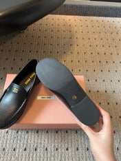 MIUMIU 26S LOAFERS IN BLACK CALFSKIN