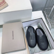 BALENCIAGA 25S MULES IN BLACK LAMBSKIN