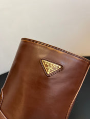 PRADA 25S PLATFORM ANKLE BOOTS IN BROWN CALFSKIN WITH GOLD HARDWARE