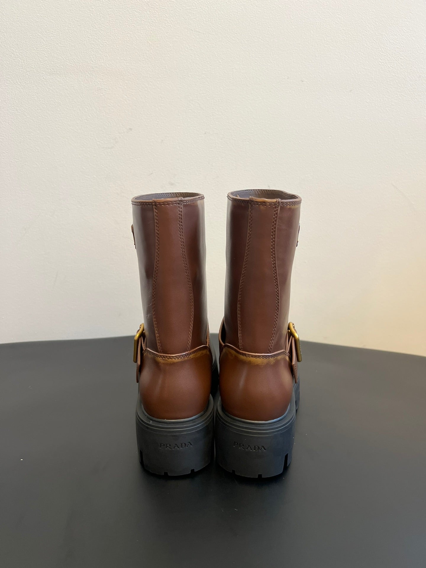 PRADA 25S PLATFORM ANKLE BOOTS IN BROWN CALFSKIN WITH GOLD HARDWARE