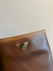 PRADA 25S HIGH-CUT PLATFORM BOOTS IN BROWN CALFSKIN WITH GOLD HARDWARE