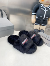 BALENCIAGA 25S FUR SLIPPERS IN BLACK FAUX SHEARLING