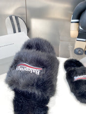 BALENCIAGA 25S FUR SLIPPERS IN BLACK FAUX SHEARLING