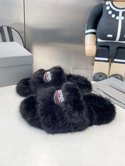 BALENCIAGA 25S FUR SLIPPERS IN BLACK FAUX SHEARLING