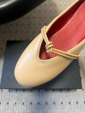 BOTTEGA VENETA 26S FLAT MULES IN BEIGE LAMBSKIN