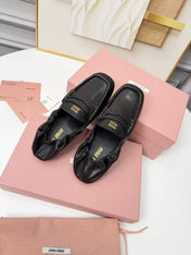 MIUMIU 26S RUCHES LOAFERS IN BLACK LAMBSKIN