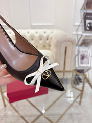 GARAVANI POINTED SLINGBACK PUMPS IN BLACK CALFSKIN