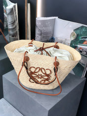 MEDIUM ANAGRAM BASKET BAG 46 IN BEIGE IRACA PALM AND TAN CALFSKIN