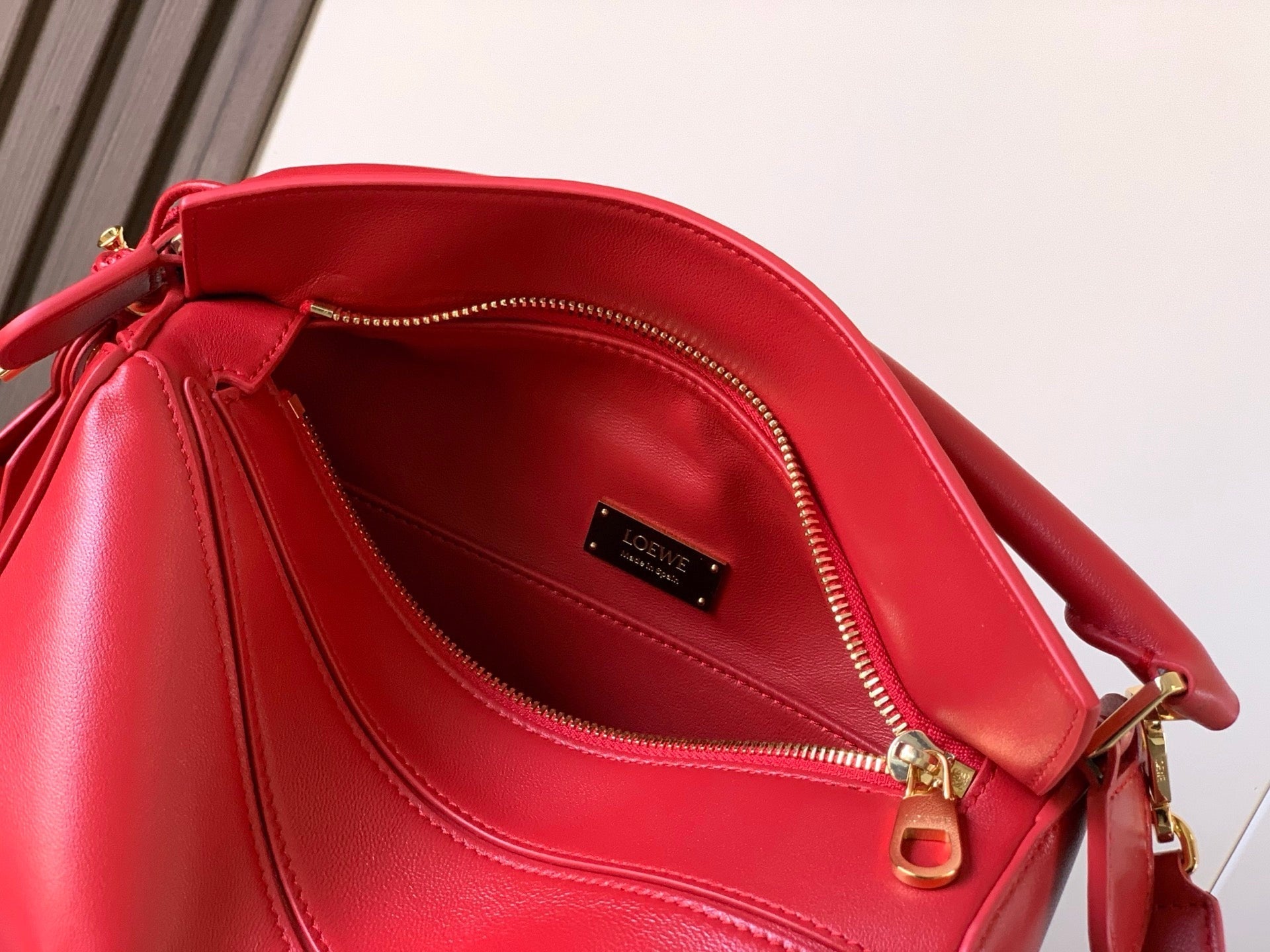 PUZZLE HANDBAG 24 IN RED CALFSKIN