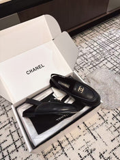 SLINGBACK LOAFER IN BLACK CALFSKIN AND SHEARLING