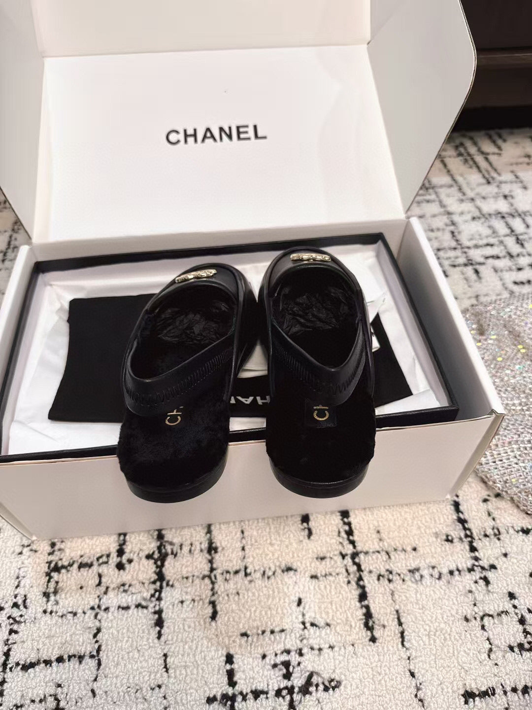 SLINGBACK LOAFER IN BLACK CALFSKIN AND SHEARLING