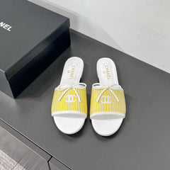 CC STRIPED SLIDE SANDALS IN YELLOW AND WHITE CANVAS