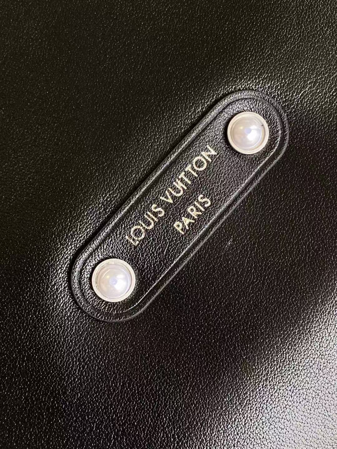 LV SHOULDER BAG 48 IN BLACK CALFSKIN EMBOSSED STRAP