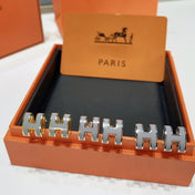 GOLD LACQUERED MINI POP H EARRINGS LIGHT GRAY