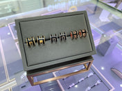 CLASSIC BLACK H ENAMEL OVAL STUD EARRINGS