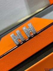 H STUD EARRINGS WITH SILVER DIAMONDS