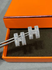 H STUD EARRINGS WITH SILVER DIAMONDS