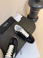 CELINE TRAINRES IN BLACK MIX WHITE SUEDE AND FABRIC