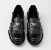 PRADA LOAFER IN BLACK PATENT CALFSKIN