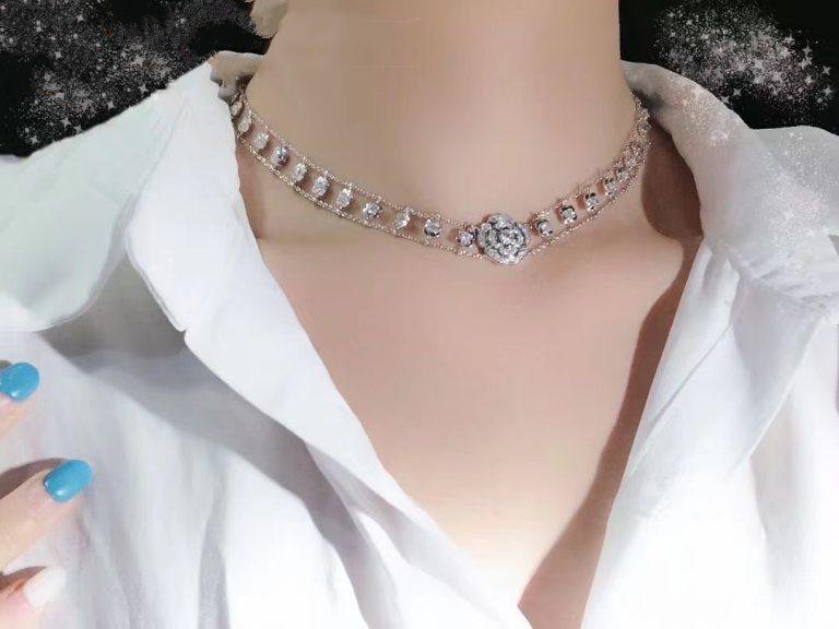 chanel-bouton-de-camelia-necklace-18k-white-gold-diamonds-j12063-coral-17-768x576_8c614f6d-c184-4012-9762-80cd0ac2b577.jpg