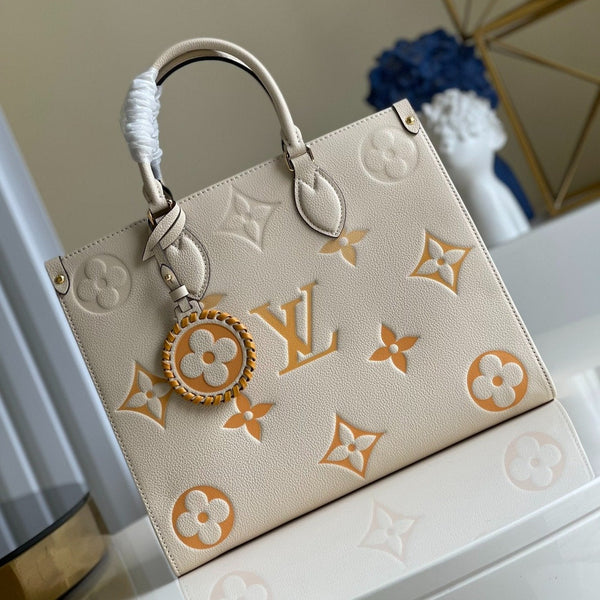 LV ONTHEGO MM 35 CREAM COWHIDE-LEATHER TRIM