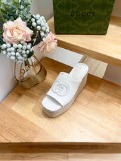 HIGH 10CM WEDGE SANDALS IN WHITE SHEEPSKIN