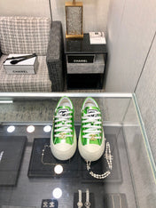 CASUAL SNEAKER IN EMERALD GREEN METALLIC LAMBSKIN WITH GOLD LOGO