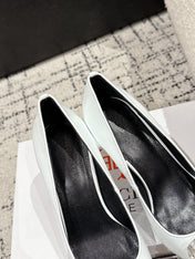 POINTED HIGH PUMPS IN WHITE PATENT CALFSKIN WITH CRYSTAL BUCKLE