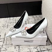 POINTED HIGH PUMPS IN WHITE PATENT CALFSKIN WITH CRYSTAL BUCKLE