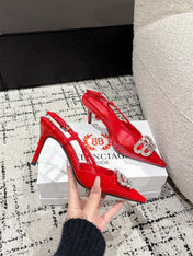 POINTED HIGH SLINGBACK IN RED PATENT CALFSKIN WITH CRYSTAL BUCKLE