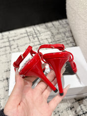 POINTED HIGH SLINGBACK IN RED PATENT CALFSKIN WITH CRYSTAL BUCKLE