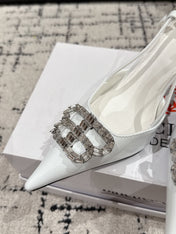 POINTED HIGH SLINGBACK IN WHITE PATENT CALFSKIN WITH CRYSTAL BUCKLE