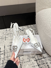 POINTED HIGH SLINGBACK IN WHITE PATENT CALFSKIN WITH CRYSTAL BUCKLE