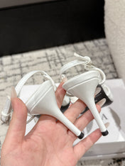 POINTED HIGH SLINGBACK IN WHITE PATENT CALFSKIN WITH CRYSTAL BUCKLE