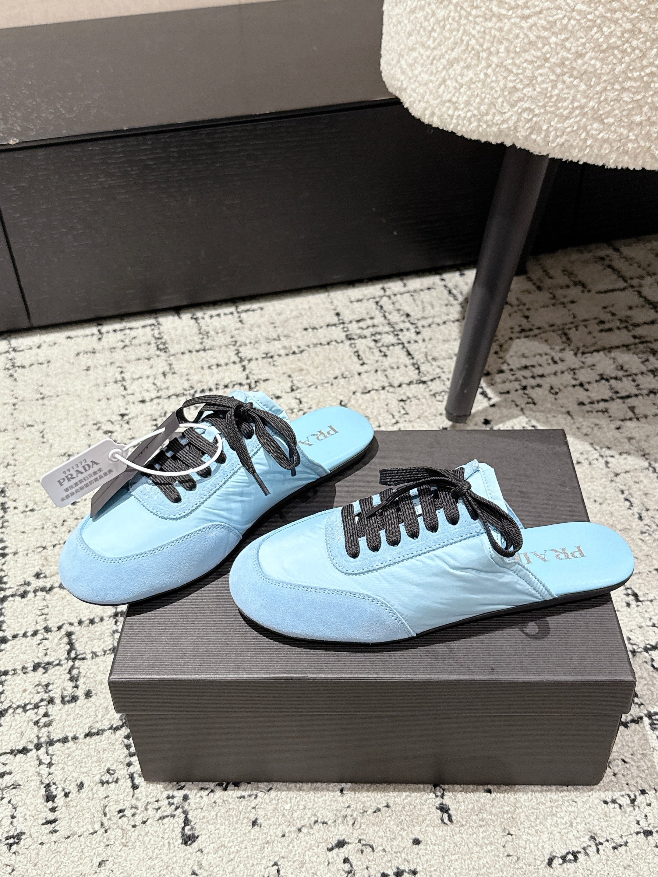 PRADA 25S DEXUN MULE IN LIGHT BLUE SUEDE LEATHER