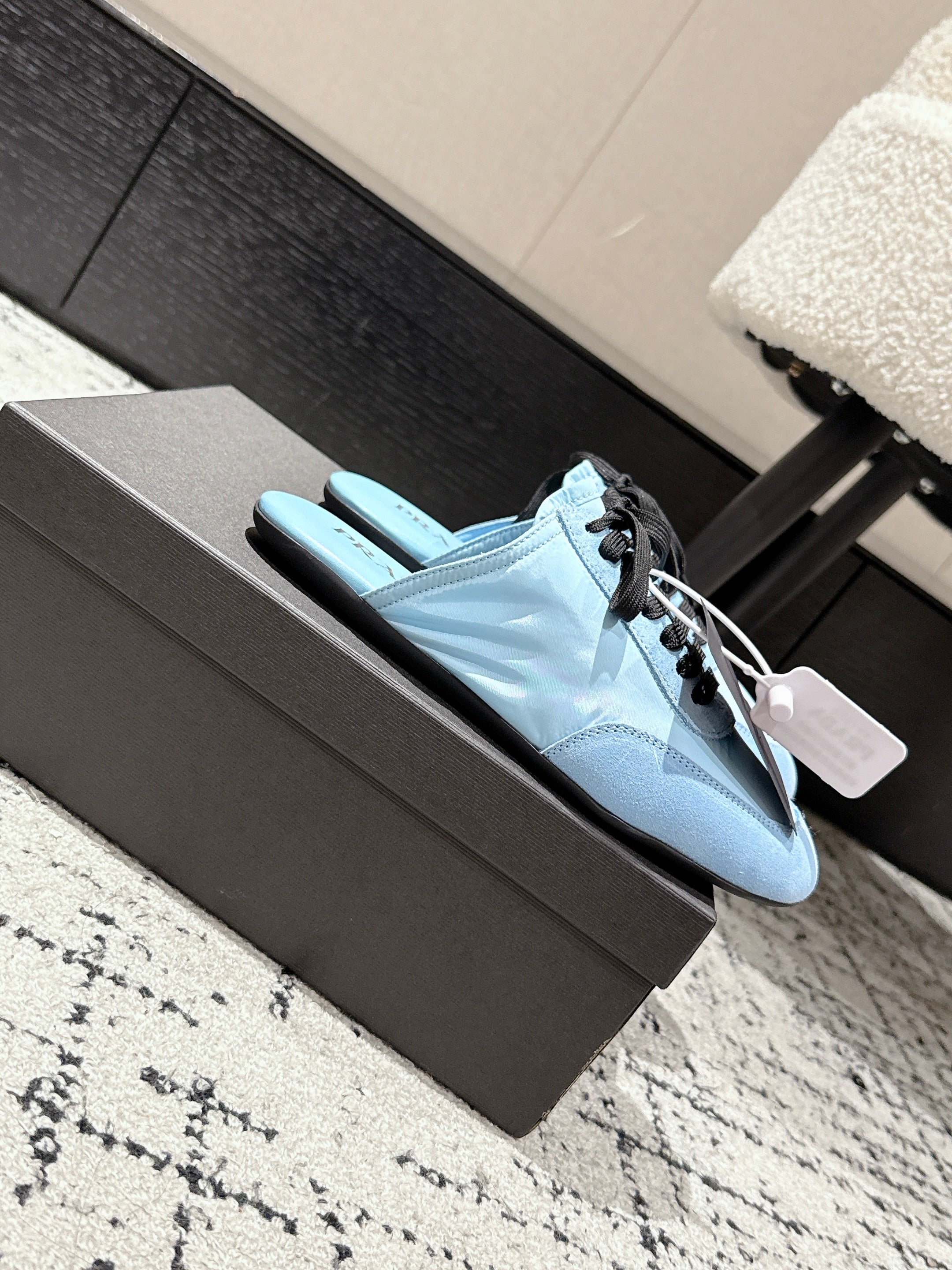 PRADA 25S DEXUN MULE IN LIGHT BLUE SUEDE LEATHER