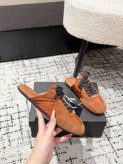 PRADA 25S DEXUN MULE IN BURNT ORANGE SUEDE LEATHER