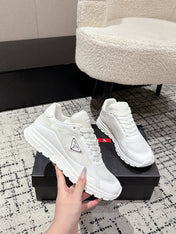 PRADA 25S MEN SNEAKERS IN WHITE CANVAS