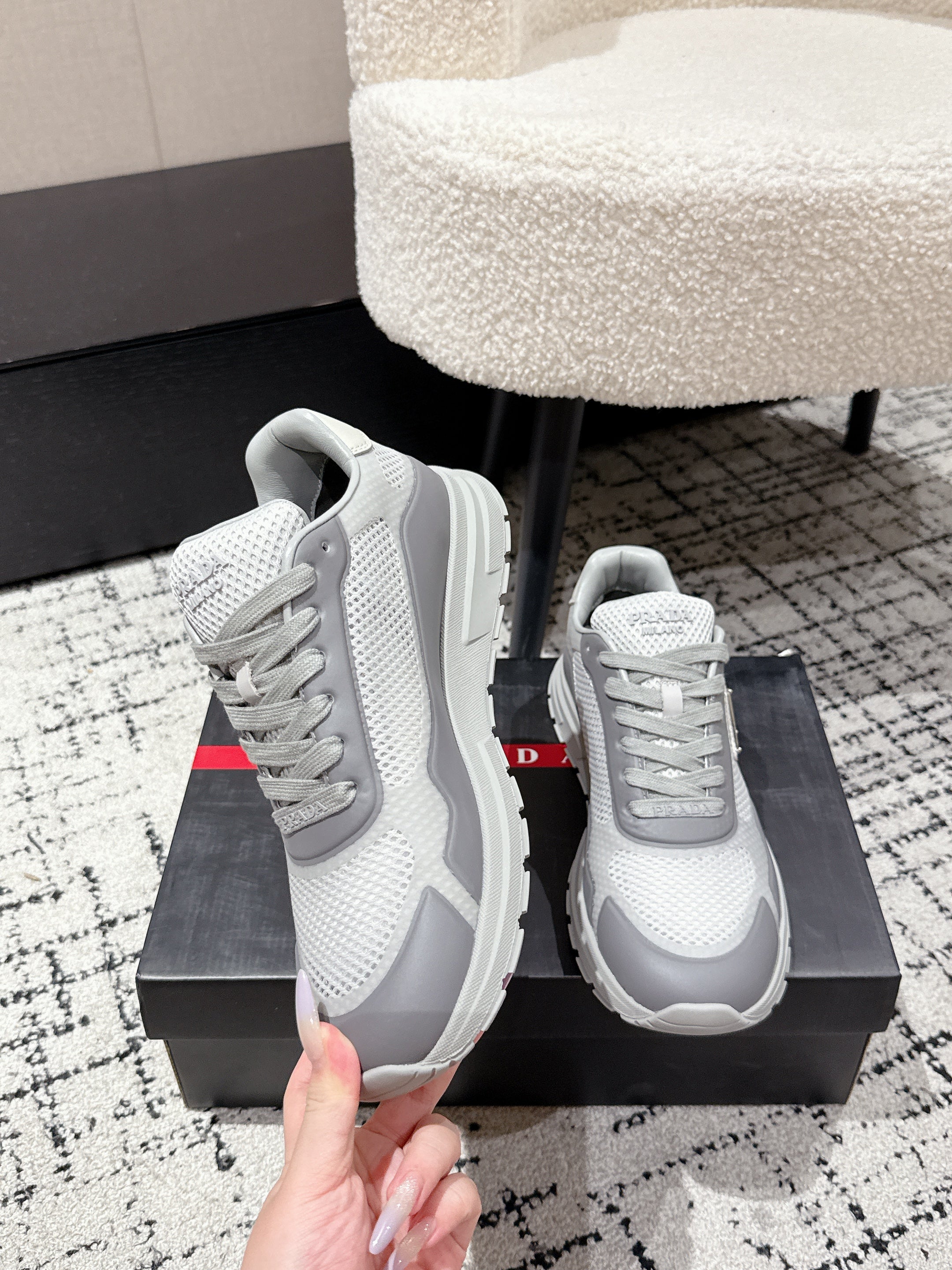 PRADA 25S MEN SNEAKERS IN GRAY AND WHITE CANVAS