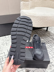 PRADA 25S MEN SNEAKERS IN BLACK CANVAS