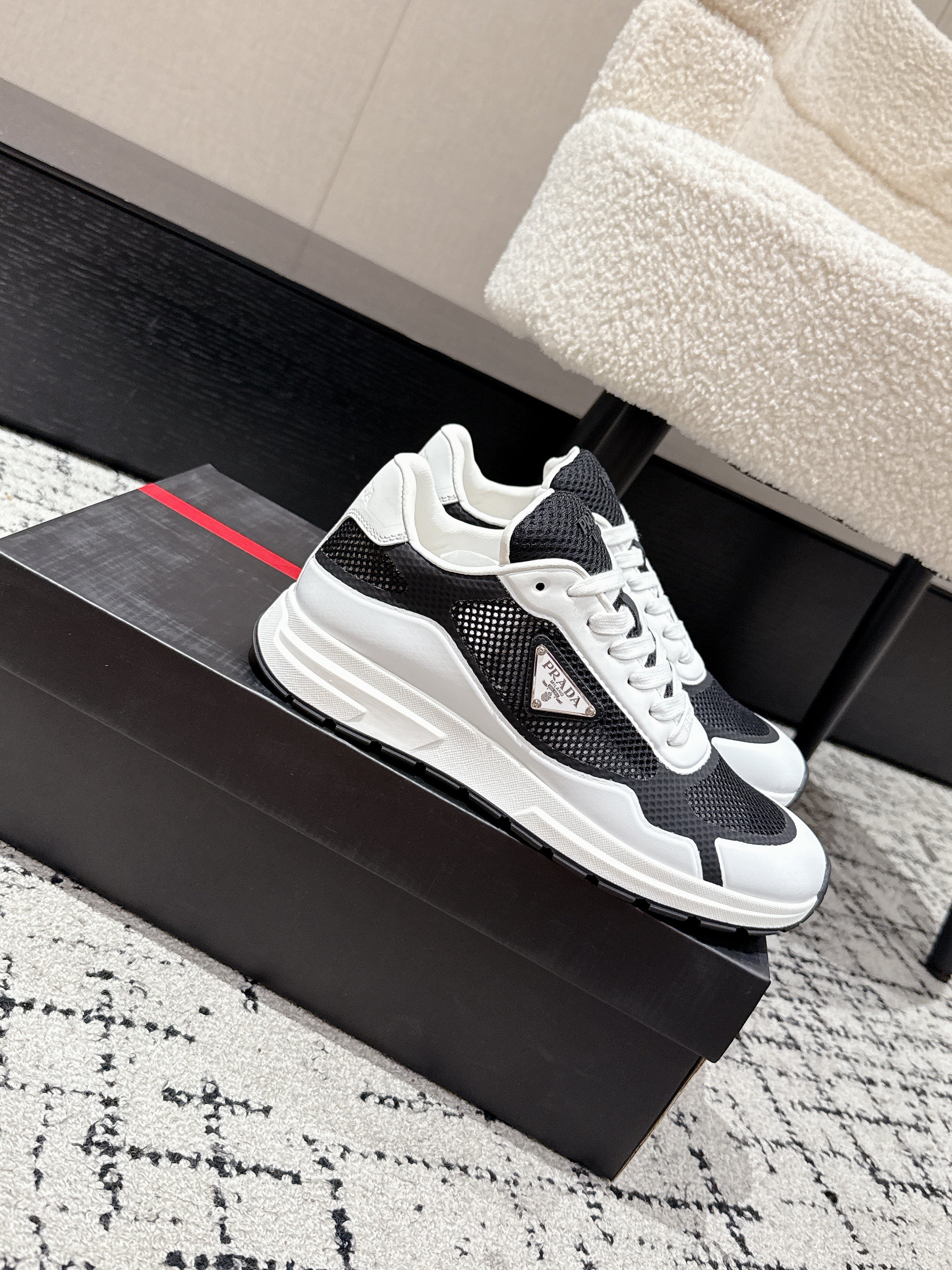 PRADA 25S MEN SNEAKERS IN BLACK AND WHITE CANVAS